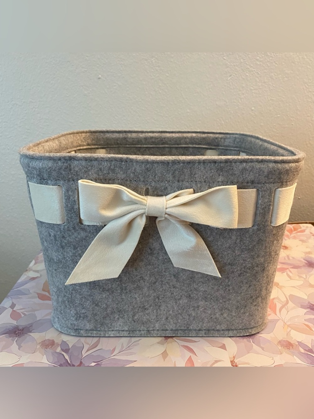 Threshold felt decorative storage basket, ivory velvet bow